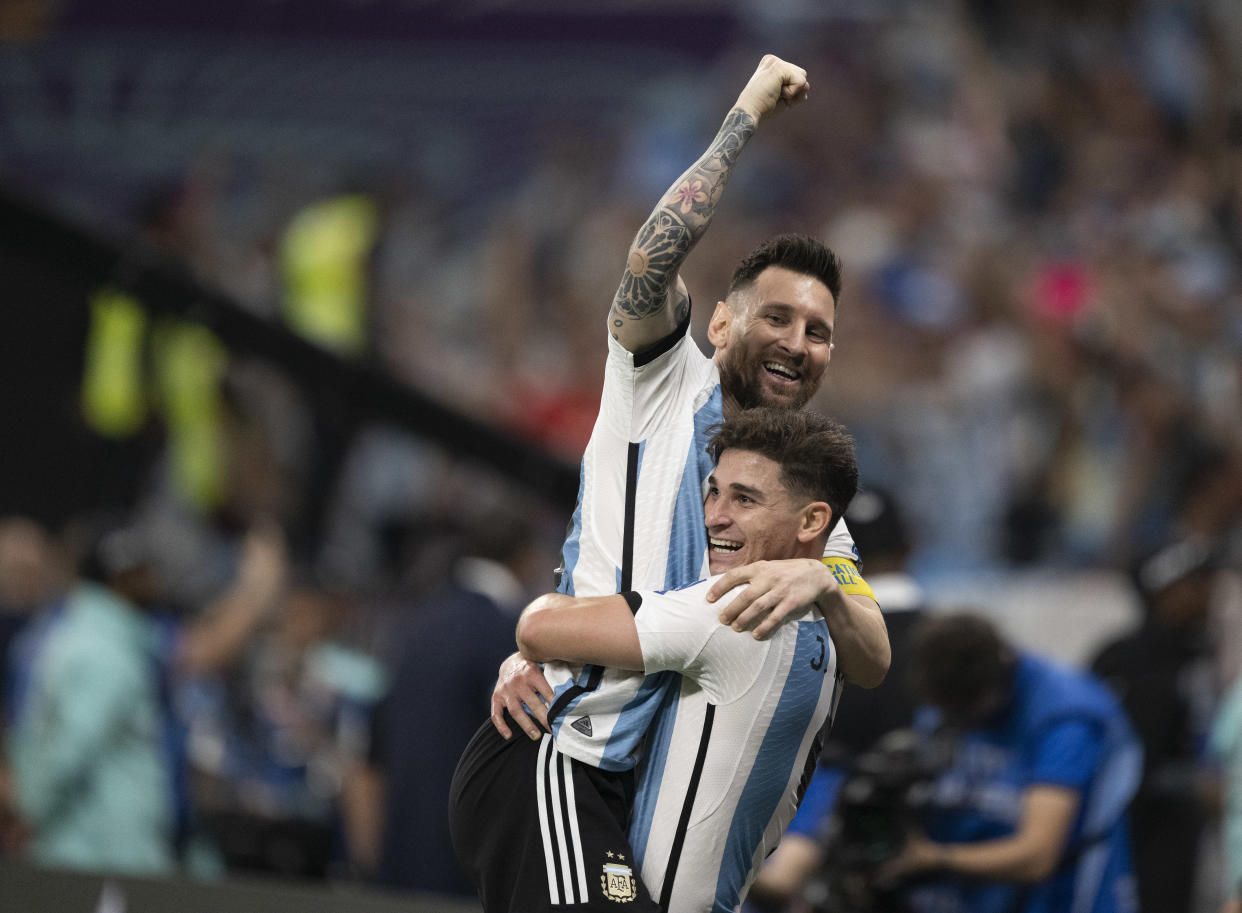 DOHA, QATAR - DECEMBER 03: Julián Álvarez celebrates with Lionel Messi after scoring the teams second goal during the FIFA World Cup Qatar 2022 Round of 16 match between Argentina and Australia at Ahmad Bin Ali Stadium on December 3, 2022 in Doha, Qatar. (Photo by Sebastian Frej/MB Media/Getty Images)