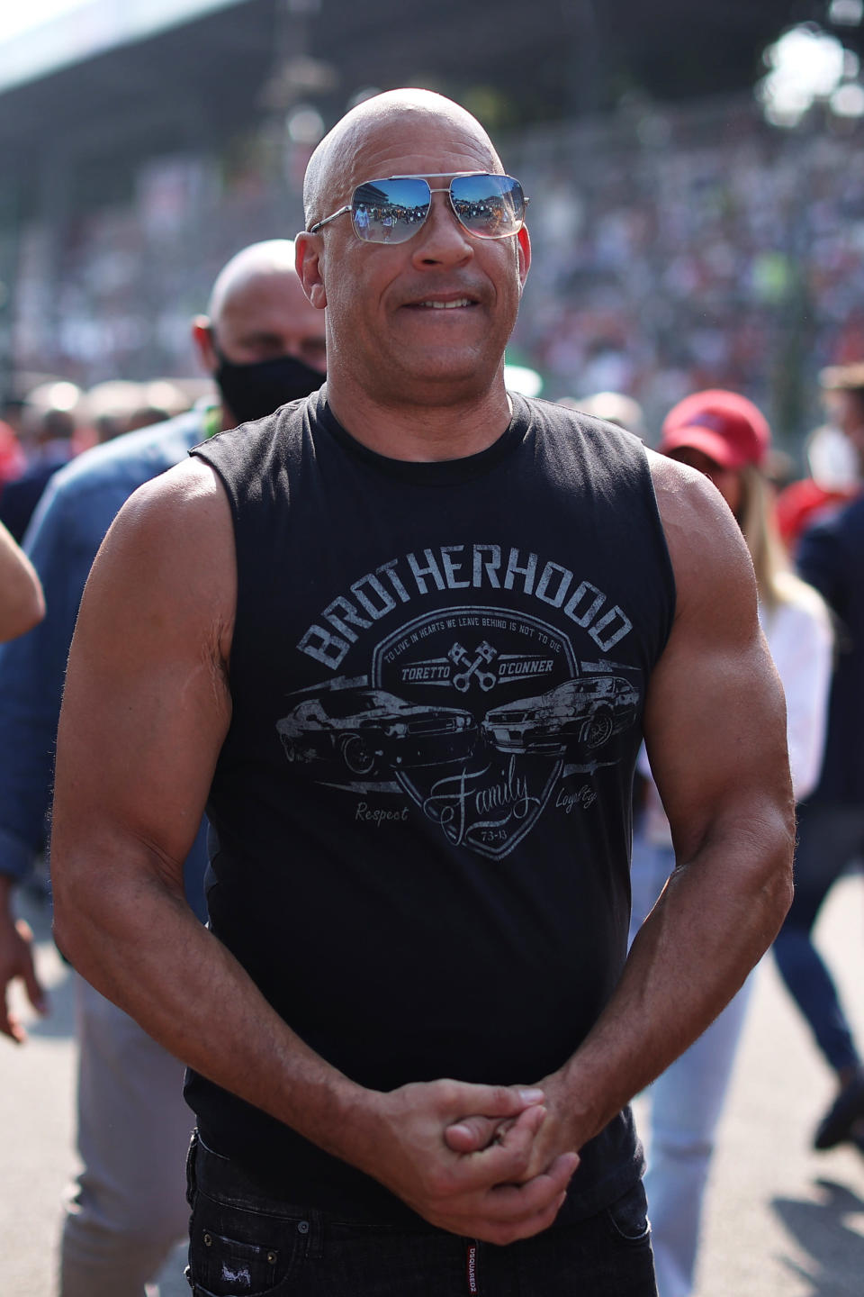Vin Diesel in a black tank that reads &quot;Brotherhood&quot;