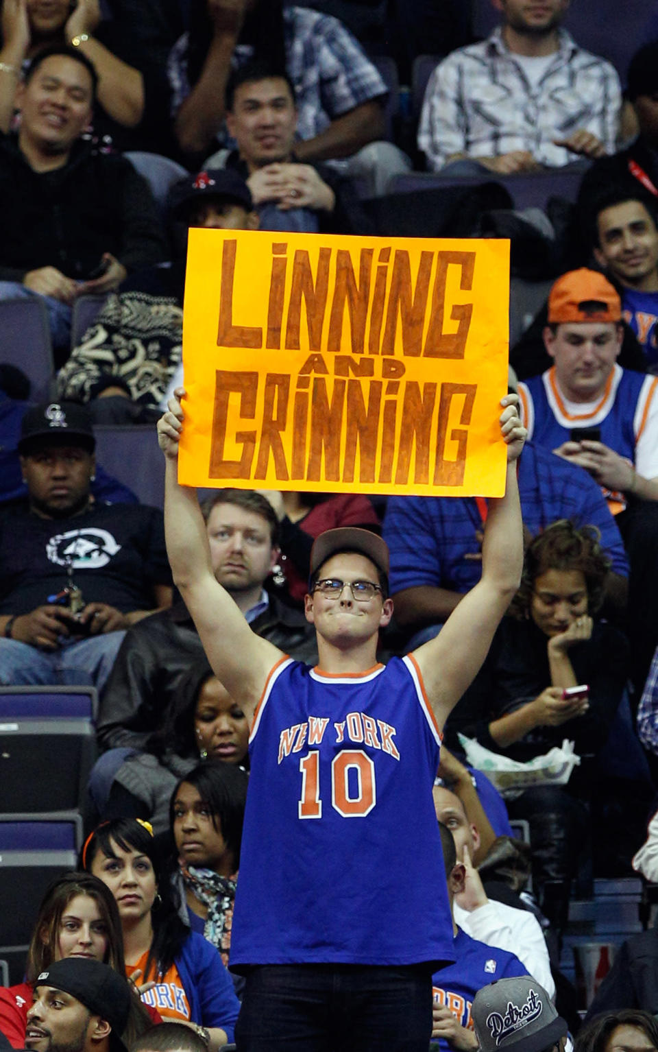 WASHINGTON, DC - FEBRUARY 08: A fan of Jeremy Lin #17 of the New York Knicks holds up a sign during the second half of the Knicks and Washington Wizards game at Verizon Center on February 8, 2012 in Washington, DC. (Photo by Rob Carr/Getty Images)