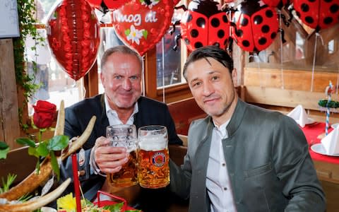 Karl-Heinz Rummenigge and Niko Kovac pose at the Oktoberfest the day after the 3-0 home defeat by 'Gladbach - Credit: Bayern Munich/Handout via Reuters