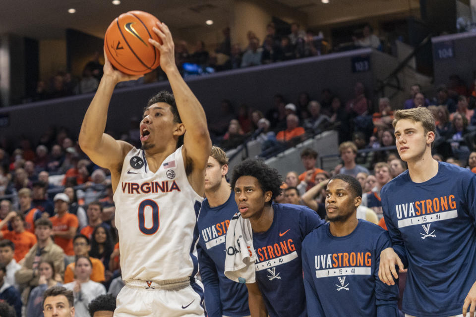 Virginia guard Kihei Clark (0) prepares to shoot against James Madison during the second half of an NCAA college basketball game in Charlottesville, Va., Tuesday, Dec. 6, 2022. (AP Photo/Erin Edgerton)