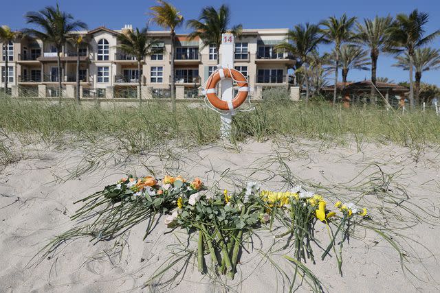 <p>Amy Beth Bennett/South Florida Sun Sentinel/Tribune News Service via Getty Images</p> A memorial for Sloan Mattingly at Lauderdale-by-the-Sea