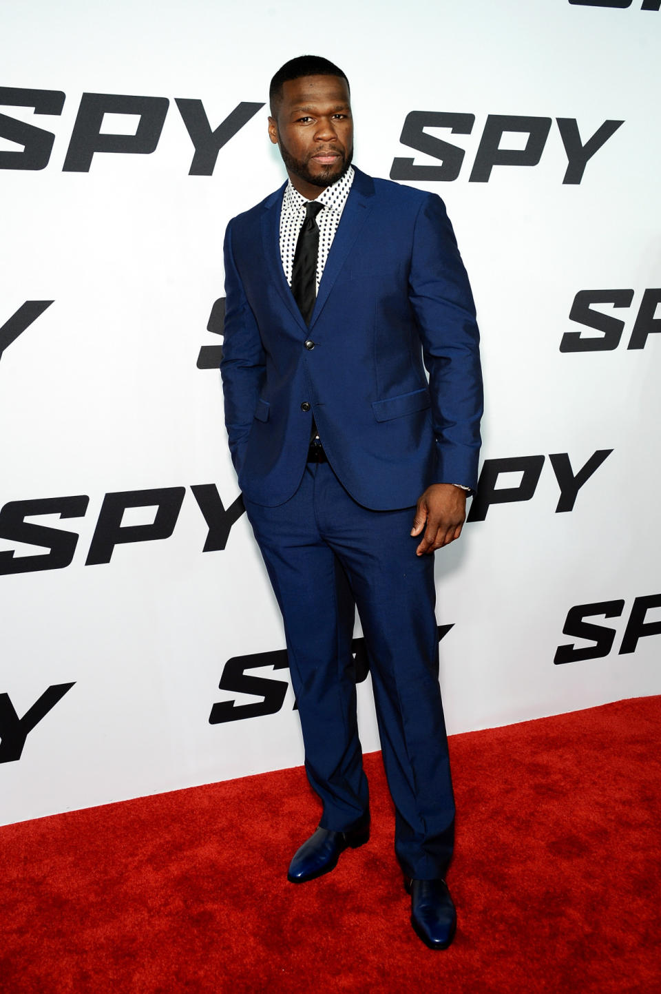 Budding fashionista 50 Cent (seriously, the guy that once sang about the candy shop now also designs underwear) almost matched Susan Sarandon in a royal blue suit. He stood out from the leading lady with a black gingham button-down shirt and black tie.