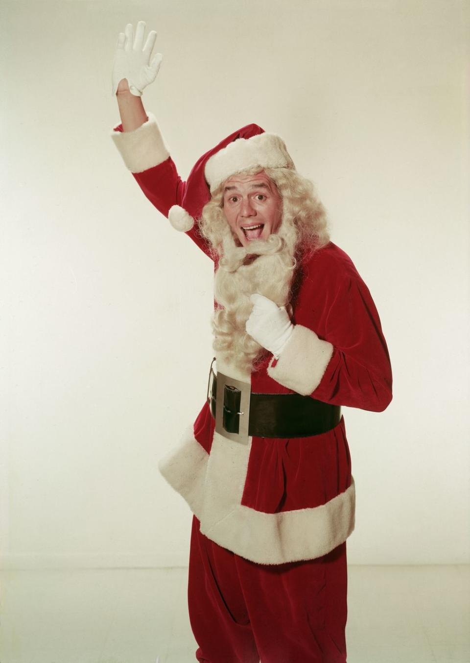 1955: Desi Arnaz dresses up as Santa Clause