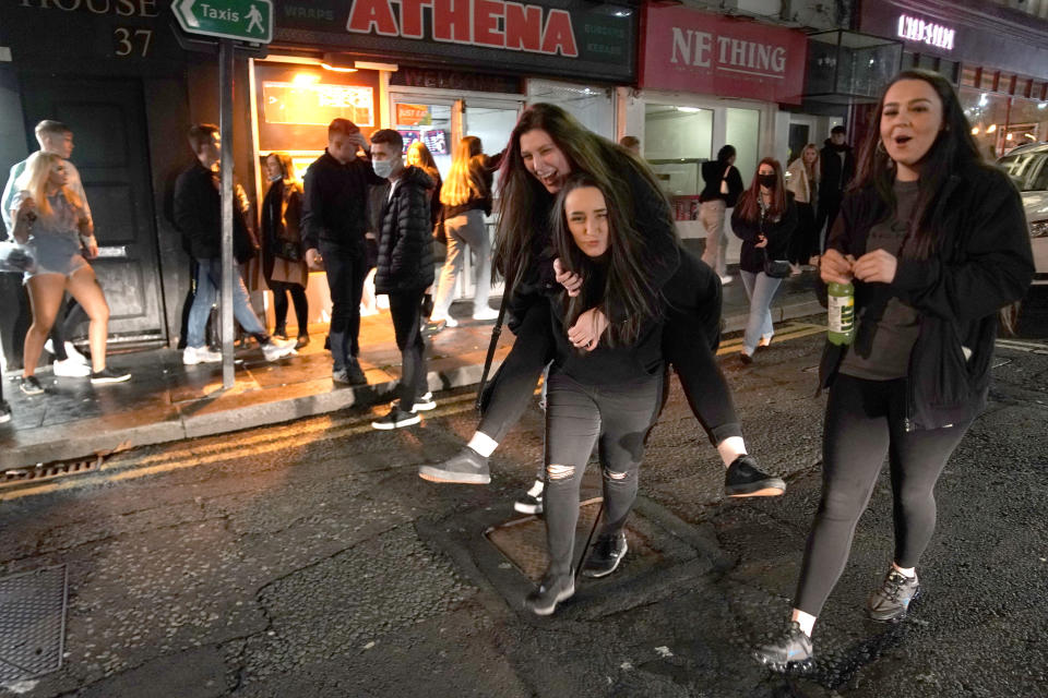 People out socialising in Newcastle city centre, ahead of the 10pm curfew that pubs and restaurants are subject to in order to combat the rise in coronavirus cases in England. Cities in northern England and other areas suffering a surge in Covid-19 cases may have pubs and restaurants temporarily closed to combat the spread of the virus.