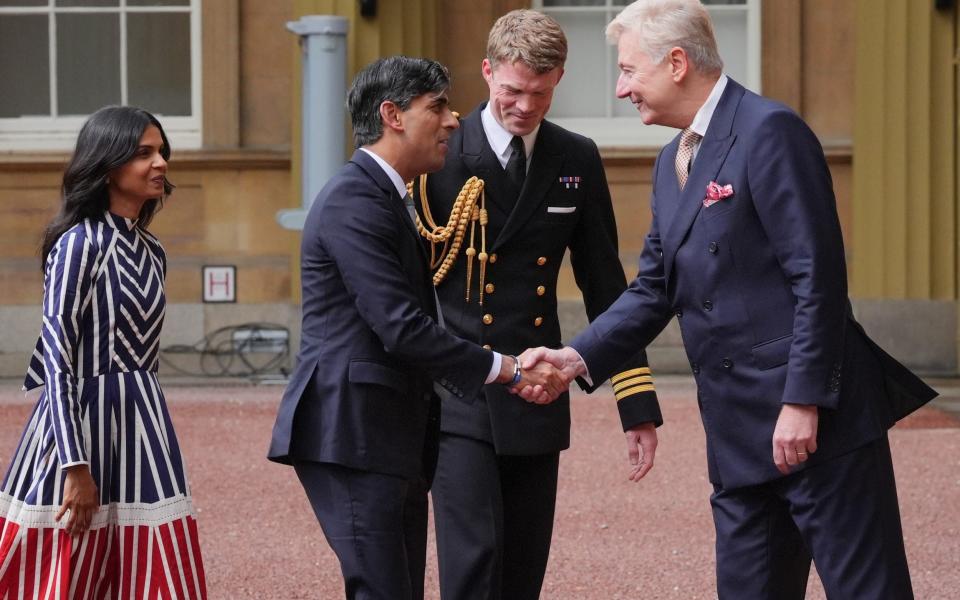 Rishi Sunak and his wife Akshata Murty, arrive at Buckingham Palace for an audience with King Charles III