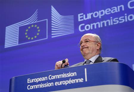 European Union Competition Commissioner Joaquin Almunia addresses a news conference at the EU Commission headquarters in Brussels December 4, 2013. REUTERS/Yves Herman