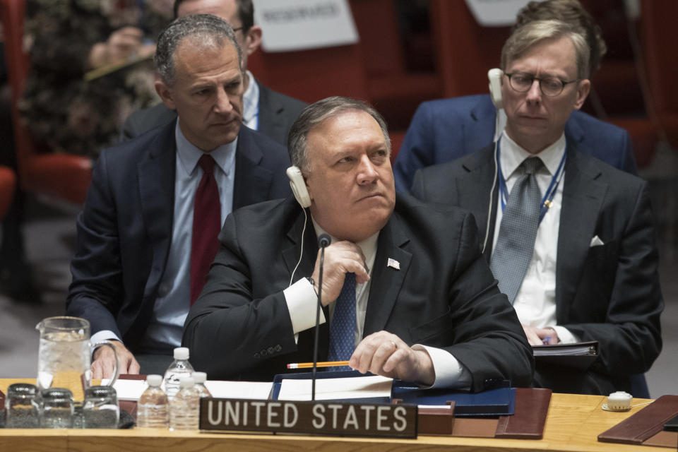 American Secretary of State Mike Pompeo adjusts his tie during a Security Council meeting on Iran's compliance with the 2015 nuclear agreement, Wednesday, Dec. 12, 2018 at United Nations headquarters. (AP Photo/Mary Altaffer)