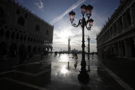 Water starts rising again in Venice, Italy, Saturday, Nov. 16, 2019. High tidal waters returned to Venice on Saturday, four days after the city experienced its worst flooding in 50 years. (AP Photo/Luca Bruno)