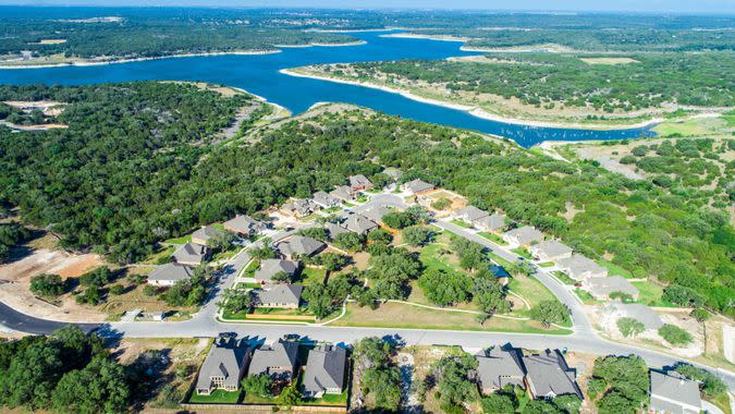 Georgetown , Texas , USA aerial drone suburb neighborhoods  roads come together and take you home - lake property.