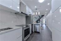 <p><span>333 Highfield Rd., Toronto, Ont.</span> <br>The quartz countertops are complimented by new stainless steel appliances.<br> (Photo: Zoocasa) </p>