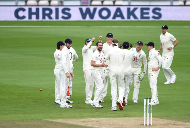 England’s Chris Woakes  celebrates the wicket of Pakistan’s Mohammed Rizwan