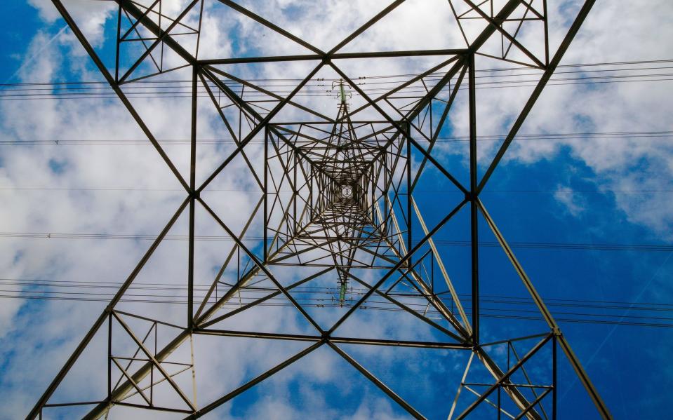 A view of an electricity pylon in Cheshire - Peter Byrne/ PA