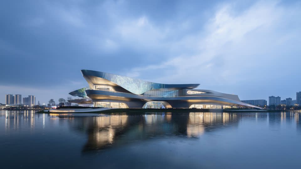 The artificial lake around the museum can help mitigate floods and irrigate the local landscape. - Arch-Exist