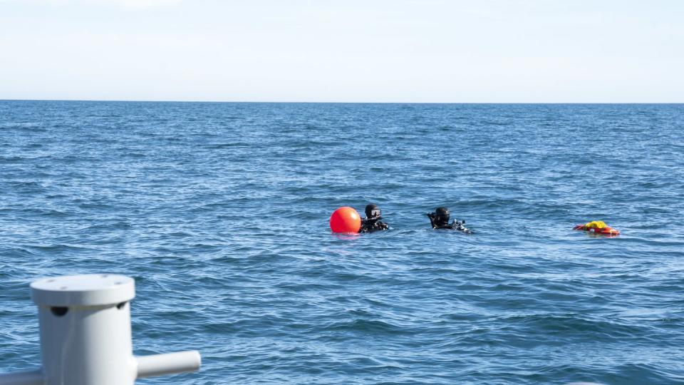 Sailors prepare to conduct a search for debris during recovery efforts of a high-altitude balloon in the Atlantic Ocean, Feb. 7, 2023. (MCS1 Ryan Seelbach/Navy)