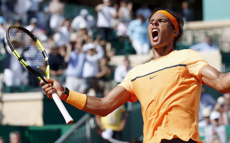 Tennis - Monte Carlo Masters - Monaco, 16/04/2016. Rafael Nadal of Spain reacts after winning his match against Andy Murray of Britain. REUTERS/Eric Gaillard