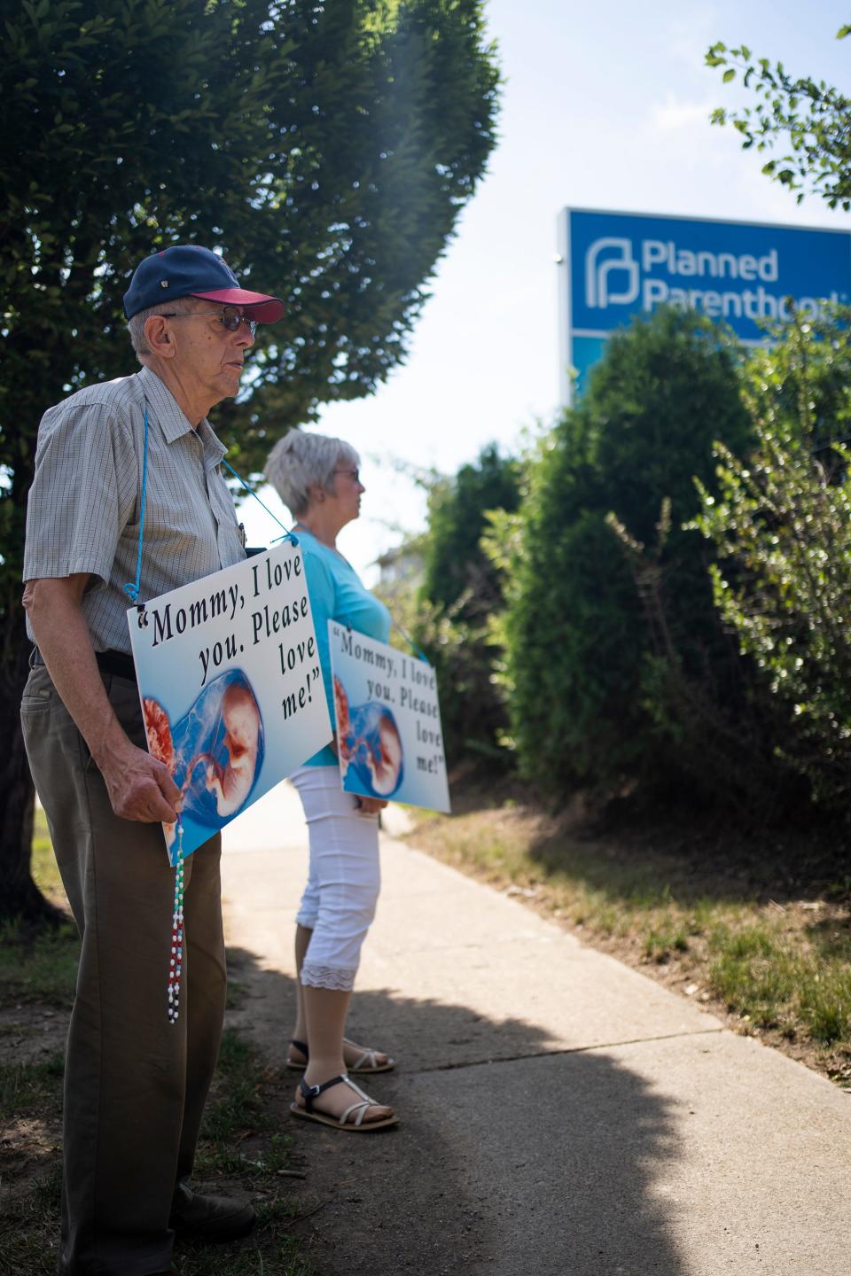 Jim and Donna Eckman, drove from Plain City to protest and pray outside of a closed Planned Parenthood on E. Main Street in Columbus, before the Supreme Court decision was announced.