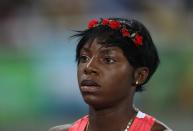 <p>Sparkle McKnight competed in the 400-meter hurdles in Rio for Trinidad and Tobago. While the her 30th place finish didn’t dazzle us, her name sure did. (Getty) </p>