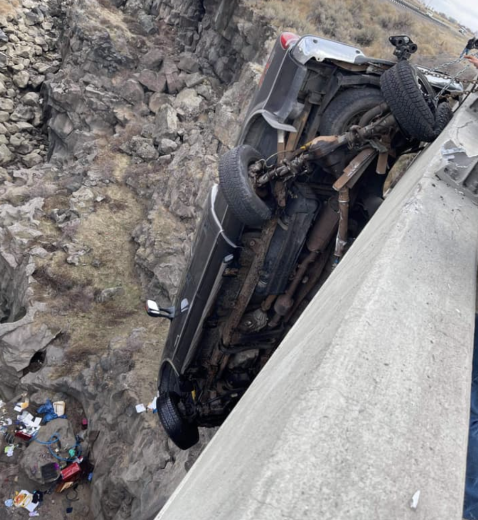 A ute dangles off Malad Gorge bridge in Idaho.