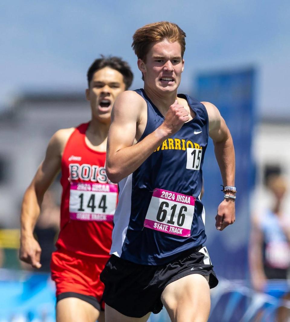 Meridian’s Nate Stadtlander edges out Boise’s Noe Kemper for first place in the 1,600 at the 5A state track meet May 17 at Mountain View High.