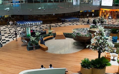 Changi Airport in Singapore is usually voted in the top five airports in the world - Credit: John S Lander/LightRocket via Getty Images