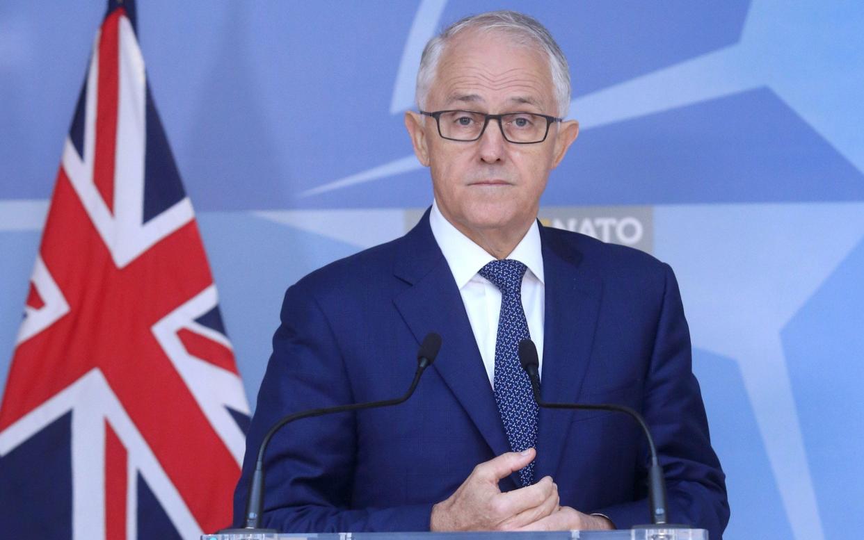 Conservatives in Mr Turnbull's coalition were reportedly sounding out colleagues for a possible leadership challenge - REUTERS