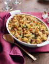 <p>The only thing that could make stuffing more satisfying: gobs and gobs of cheddar cheese. We added 6 oz. extra-sharp Cheddar for this recipe. </p><p>Get the <a href="https://www.womansday.com/food-recipes/food-drinks/recipes/a52075/cheddar-and-herb-stuffing/" rel="nofollow noopener" target="_blank" data-ylk="slk:Cheddar and Herb Stuffing recipe;elm:context_link;itc:0;sec:content-canvas" class="link "><strong>Cheddar and Herb Stuffing recipe</strong></a>.</p>