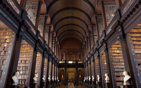The beautiful, barrel-vaulted Long Room Library in Trinity College - Credit: AP/FOTOLIA