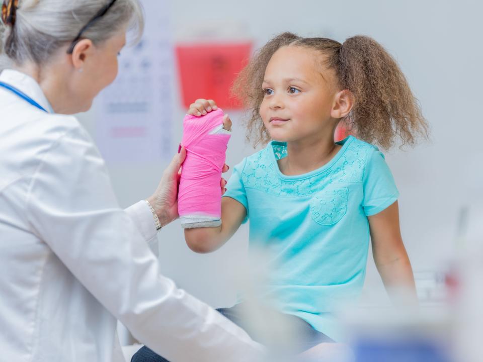 A stock photo of a child at the doctor's office.