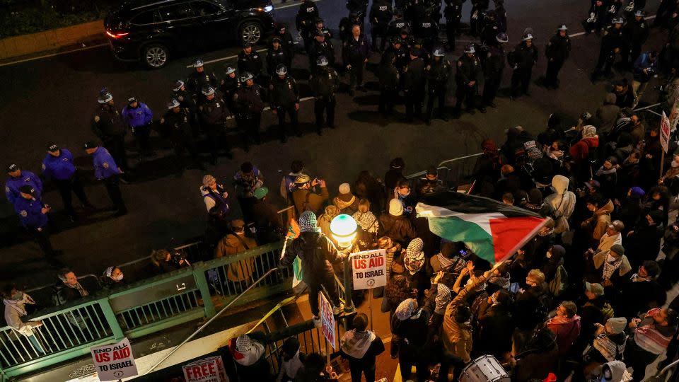 Demonstrators face off with NYPD officials outside the main entrance of Columbia University, as they stand in solidarity with the ongoing protests in support of Palestinians happening on the university campus in New York City, on April 24. - Caitlin Ochs/Reuters