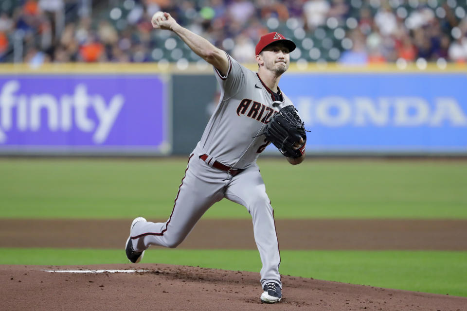 Arizona Diamondbacks starting pitcher Zach Davies throws against the Houston Astros during the first inning of a baseball game Tuesday, Sept. 27, 2022, in Houston. (AP Photo/Michael Wyke)