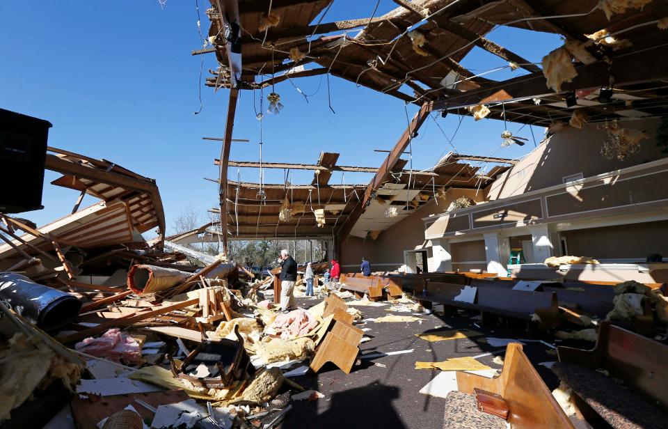 Stunned residents of Columbus, Mississippi, were picking up the pieces Sunday after a violent tornado ripped through town, leaving one person dead.