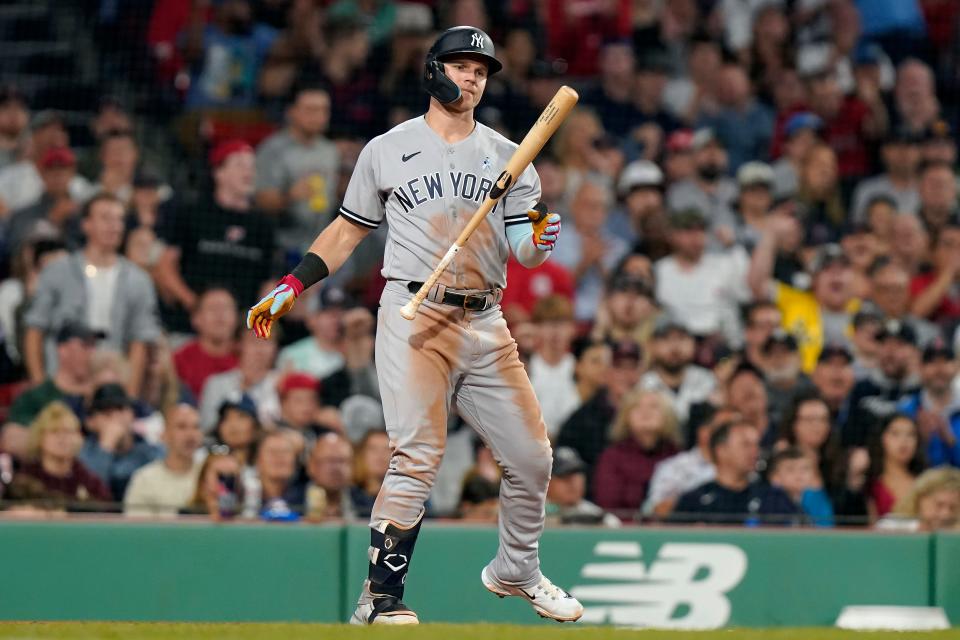 New York Yankees' Jake Bauers steps away from the batter's box after he struck out swinging in the seventh inning of the second game of a doubleheader against the Boston Red Sox, Sunday, June 18, 2023, in Boston. (AP Photo/Steven Senne)