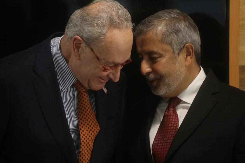 Sen. Charles Schumer has a quick word with Sanjay Mehrotra, president and CEO of Micron Technology, during a press conference held at NextCorps in downtown Rochester announcing the Buffalo, Rochester and Syracuse regions wins the federal Tech Hub designation from the CHIPS & Science Act of 2022.