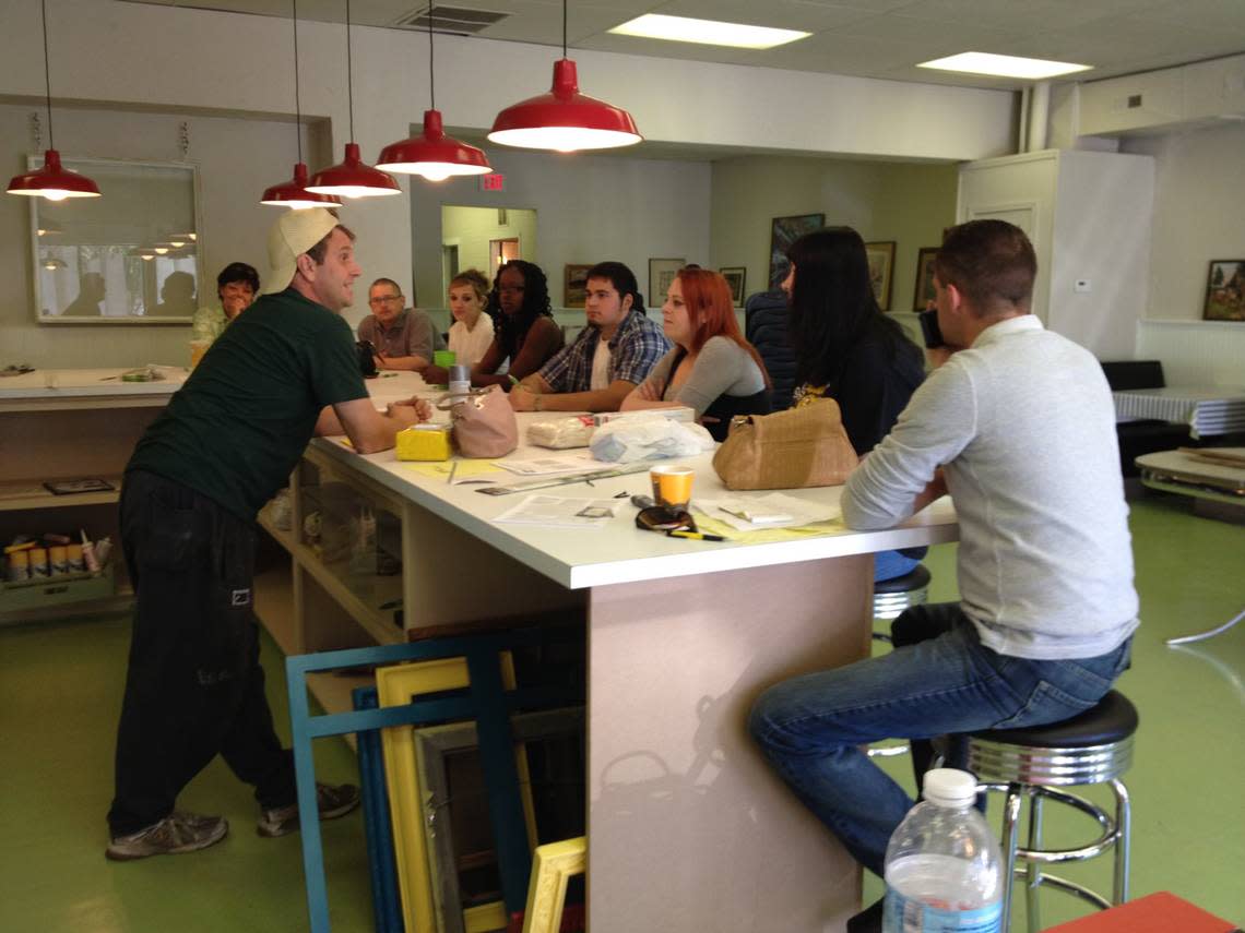 Patrick Shibley meets with the first crew he hired as he prepared to open Doo-Dah Diner in 2012.