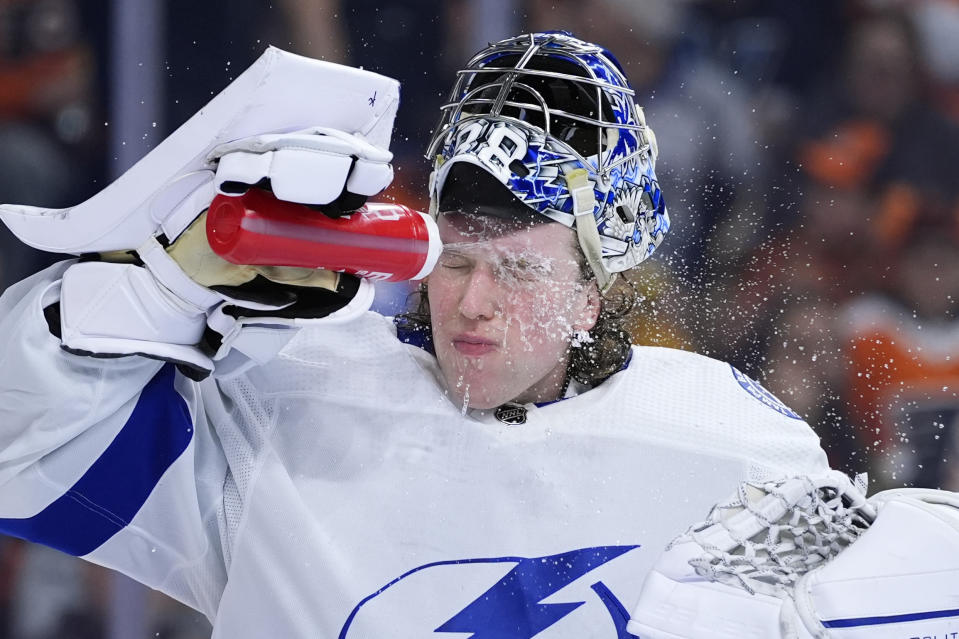 Tampa Bay Lightning's Andrei Vasilevskiy sprays himself with water during the second period of an NHL hockey game against the Philadelphia Flyers, Tuesday, Feb. 27, 2024, in Philadelphia. (AP Photo/Matt Slocum)