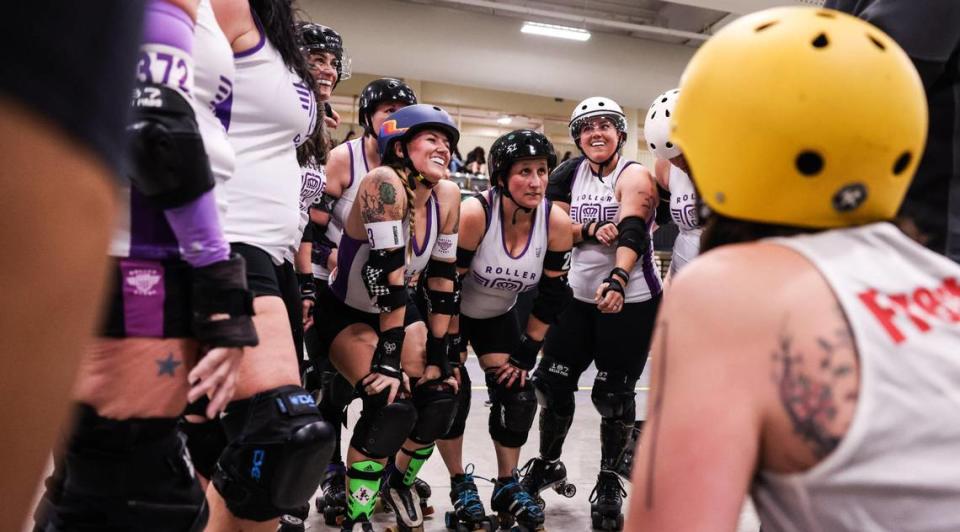 Charlotte Roller Derby huddles before their game against Collision in Charlotte, N.C., on Saturday, March 11, 2023.