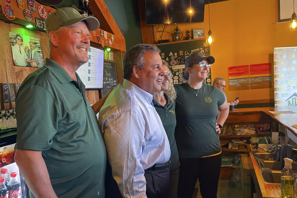 Republican presidential candidate former New Jersey Gov. Chris Christie poses for a photo Tuesday, Sept. 12, 2023, at a brewery in Goffstown, N.H. He's one of the few GOP candidates focusing on the Granite State this year. Most of the Republican presidential field is focusing their money, time and attention on Iowa. (AP Photo/Steve Peoples)