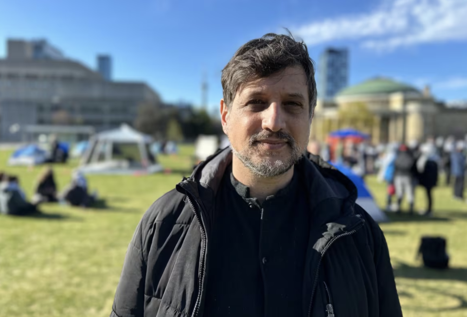 Alejandro Paz, a faculty member at U of T, says that the school's administration has failed to adequately address some students' concerns about its financial interests. (Meagan Fitzpatrick/CBC)