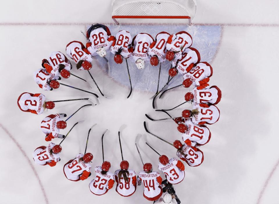 <p>Russian athlete Nadezhda Morozova (92) huddles with teammates after the quarterfinal round of the womenâs hockey game against Switzerland at the 2018 Winter Olympics in Gangneung, South Korea, Saturday, Feb. 17, 2018. The team from Russia won 6-2. (AP Photo/Frank Franklin II) </p>