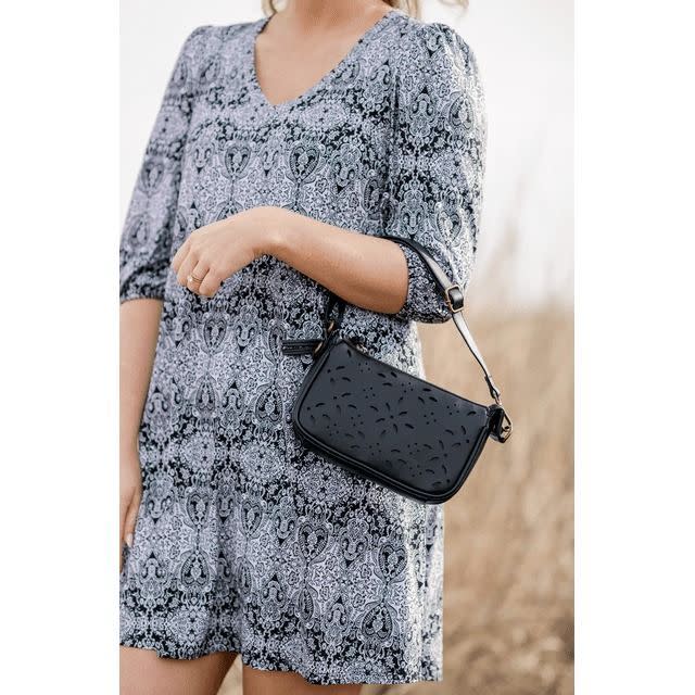 <p><a href="https://go.redirectingat.com?id=74968X1596630&url=https%3A%2F%2Fwww.walmart.com%2Fip%2FThe-Pioneer-Woman-Amelia-Wristlet-Black-Women-s%2F5023879173&sref=https%3A%2F%2Fwww.goodhousekeeping.com%2Fbeauty%2Ffashion%2Fa60548368%2Fthe-pioneer-woman-accessories-walmart%2F" rel="nofollow noopener" target="_blank" data-ylk="slk:Shop Now;elm:context_link;itc:0;sec:content-canvas" class="link rapid-noclick-resp">Shop Now</a></p><p>The Pioneer Woman Amelia Wristlet in Black</p><p>$19.00</p>