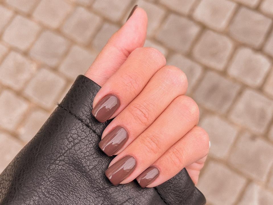 Brown manicure.