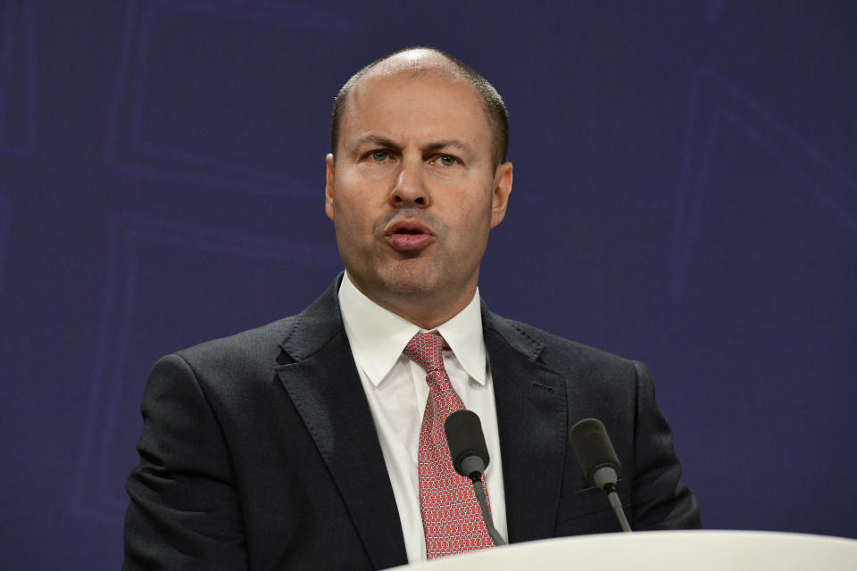 Australian Treasurer Josh Frydenberg speaks to the media during a press conference in Sydney, Friday, July 26, 2019. The Australian government released report that recommends more regulation on the market power of multinational digital platforms including Google and Facebook that would ensure fair deals for other media businesses and more control for individuals over how their data is used. (Bianca De Marchi/AAP Image via AP)