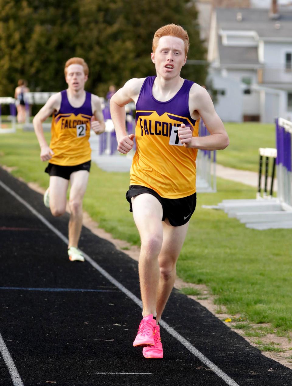 Brothers Logan Murphy, left, and Conner Murphy brought in the top times in the 1600-meter run during the VanderPan Invitational meet, Friday, May 5, 2023, in Sheboygan Falls, Wis.