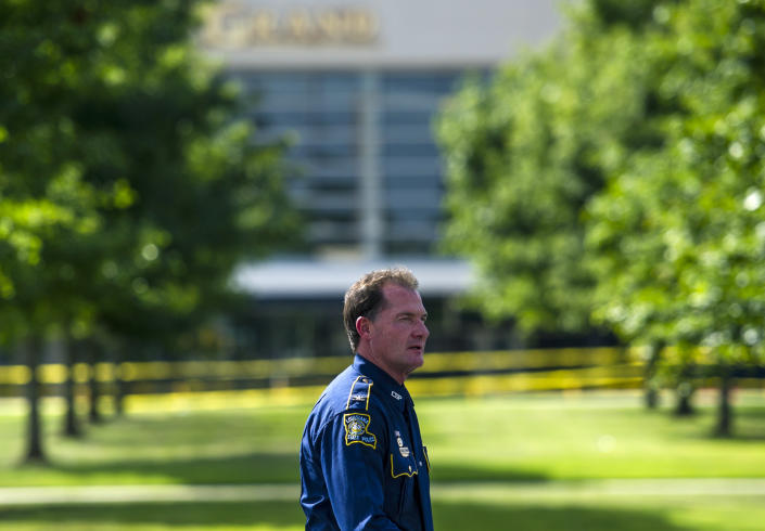Col. Mike Edmondson, superintendent of the Louisiana State Police, walks in front of the Grand Theatre in Lafayette, La., Friday, July 24, 2015. A gunman opened fire on moviegoers inside the theater Thursday. (Paul Kieu/The Daily Advertiser via AP) NO SALES; MANDATORY CREDIT