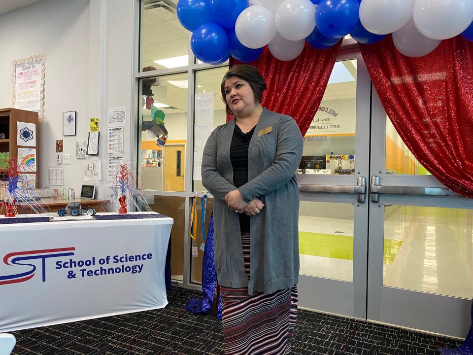 School of Science and Technology Elementary School principal Maggie Rivera shares information about the campus during a Texas Public Charter Schools Association visit on April 6, 2023.