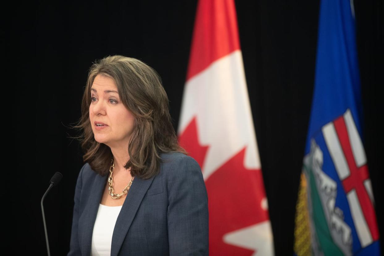 Alberta Premier Danielle Smith introduces legislation that requires provincial officials to vet and approve any agreement Ottawa signs with municipalities, universities and other provincial entities, as part of her ongoing feud with the Trudeau Liberal government. (Jason Franson/Canadian Press - image credit)