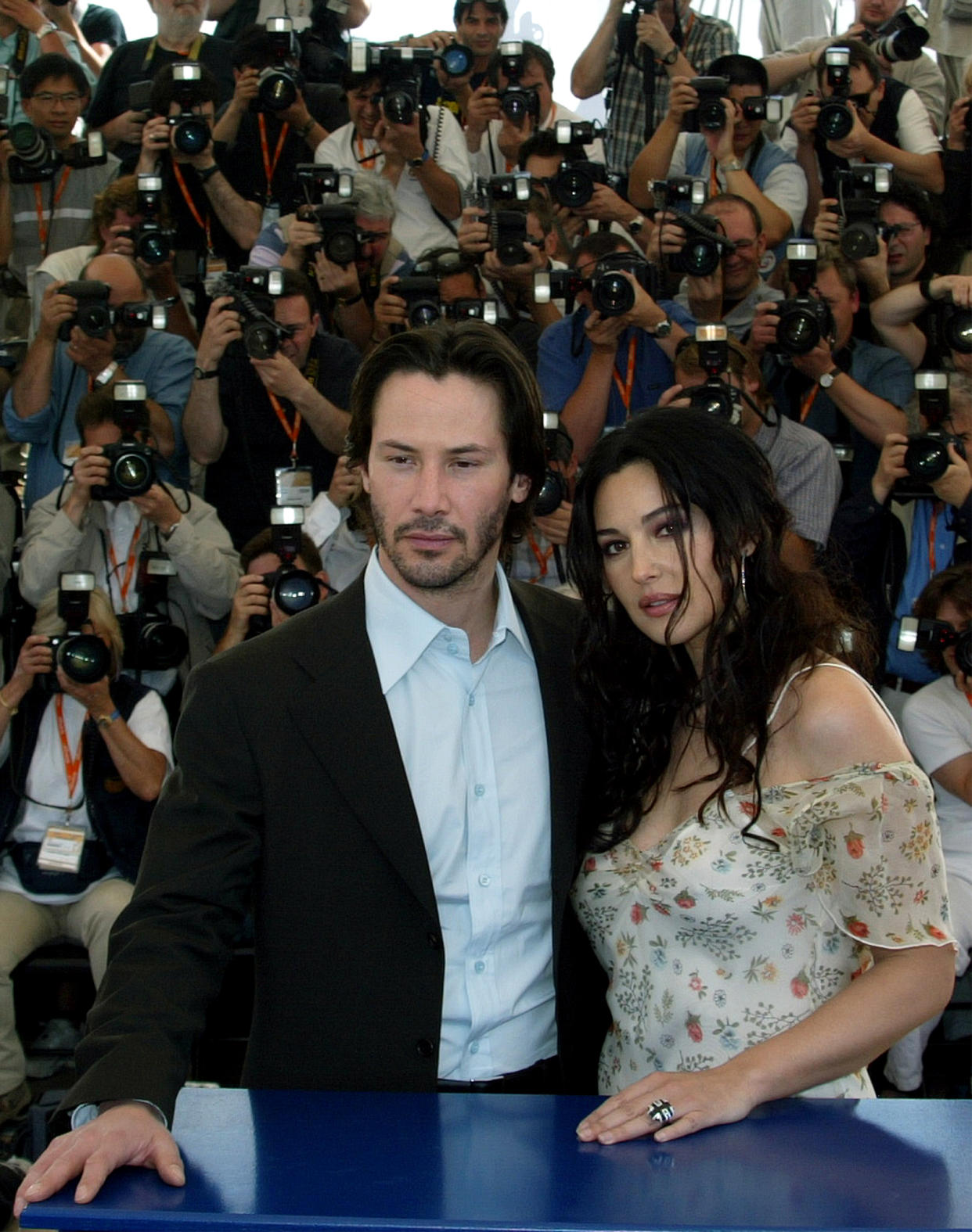 Keanu Reeves y Monica Bellucci posando en el Festival de Cannes donde presentaron 