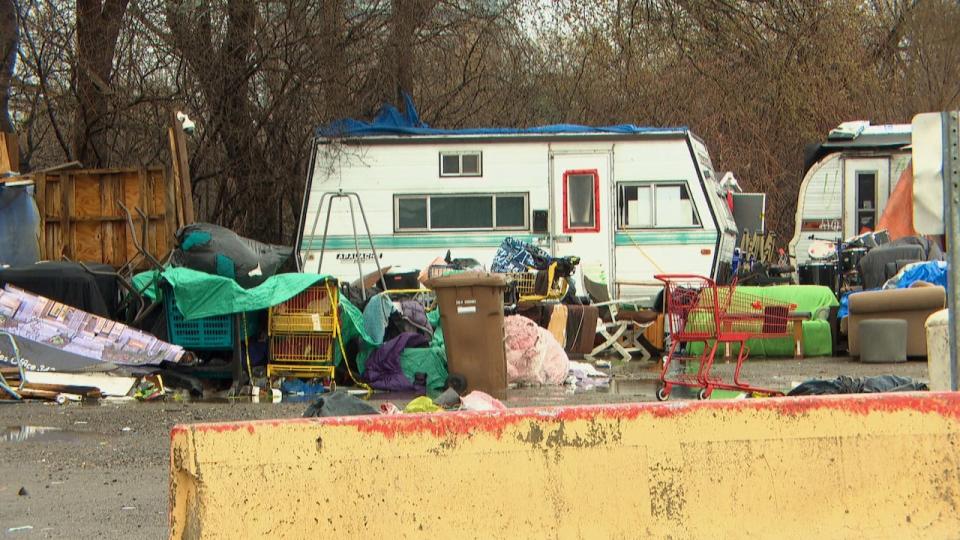 Near the heated tents, other makeshift tents and campers are also set up.