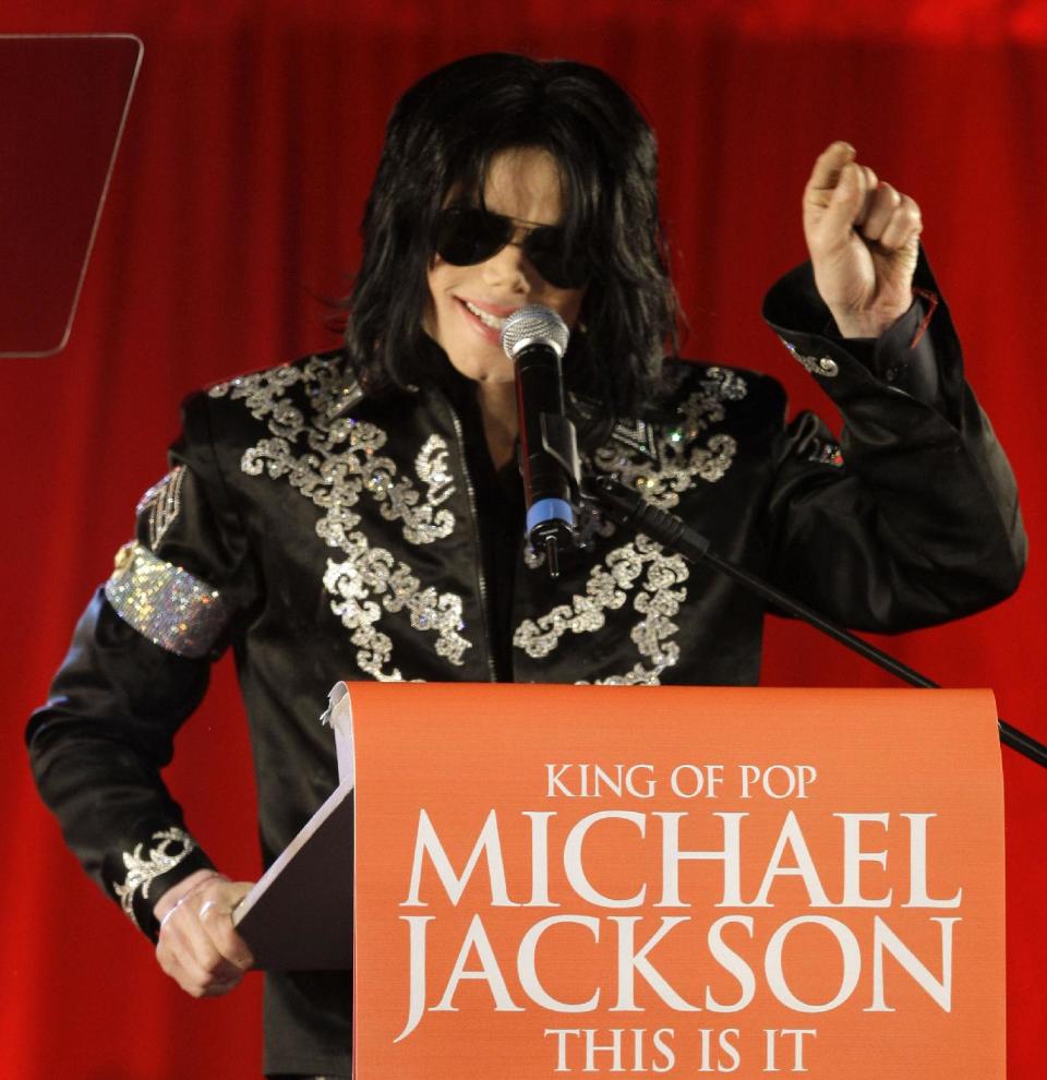 FILE - In this March 5, 2009 file photo, Michael Jackson announces several concerts at the London O2 Arena in July, at a press conference at the London O2 Arena. An AEG Live accounting executive testified Monday, May 20, 2013, in a Los Angeles courtroom that the company spent $24 million on preparations for Jackson’s ill-fated “This Is It” shows, however never paid the singer’s personal doctor convicted of involuntary manslaughter because a fully-signed agreement was never obtained. (AP Photo/Joel Ryan, file)